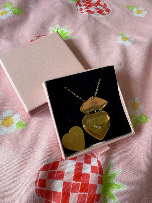 Golden heart locket
