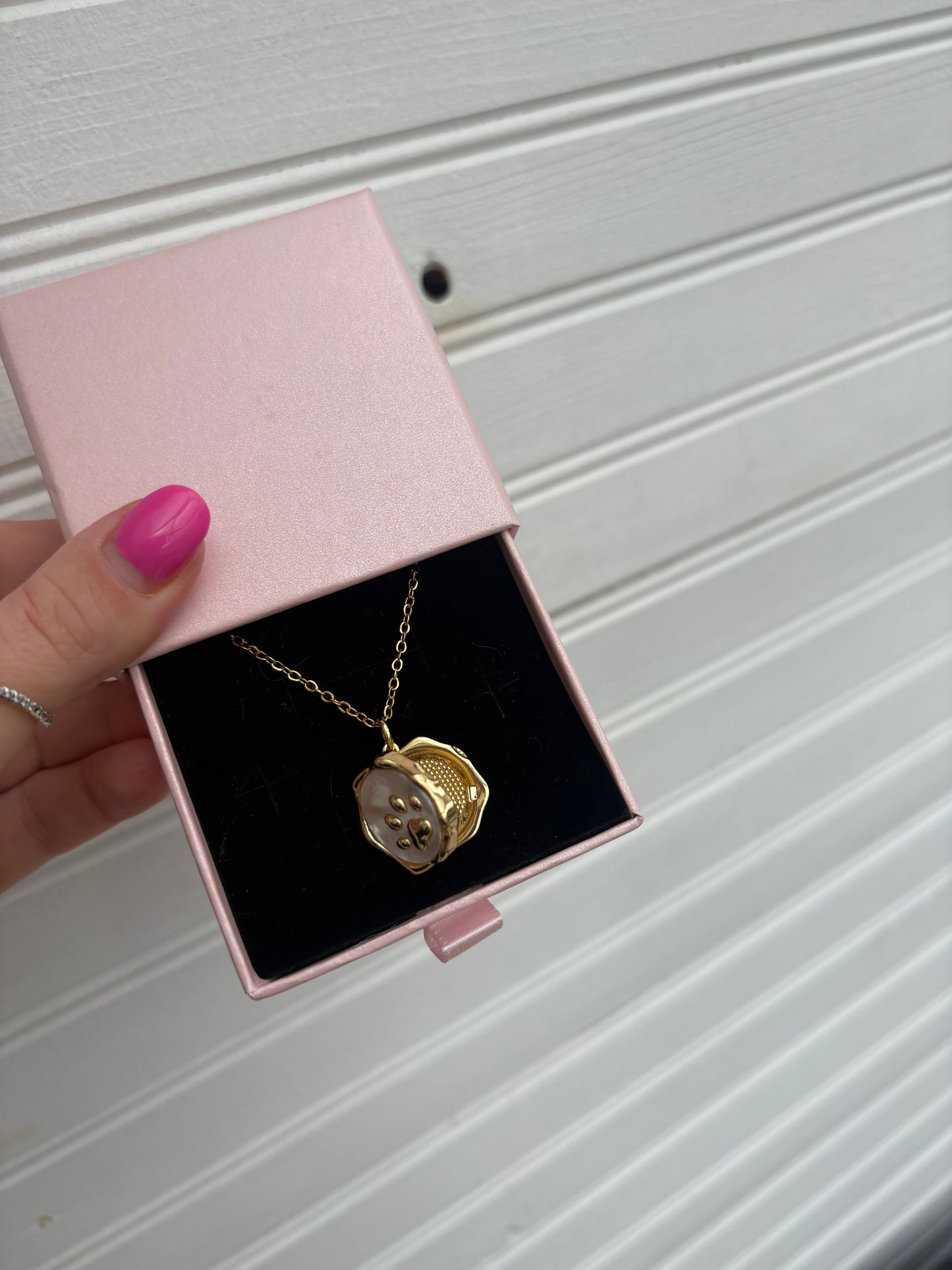 Paw locket