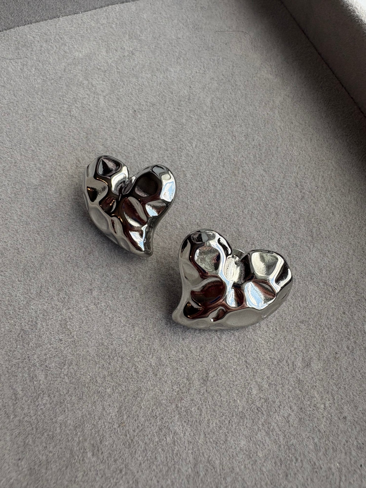 Silver hole heart studs