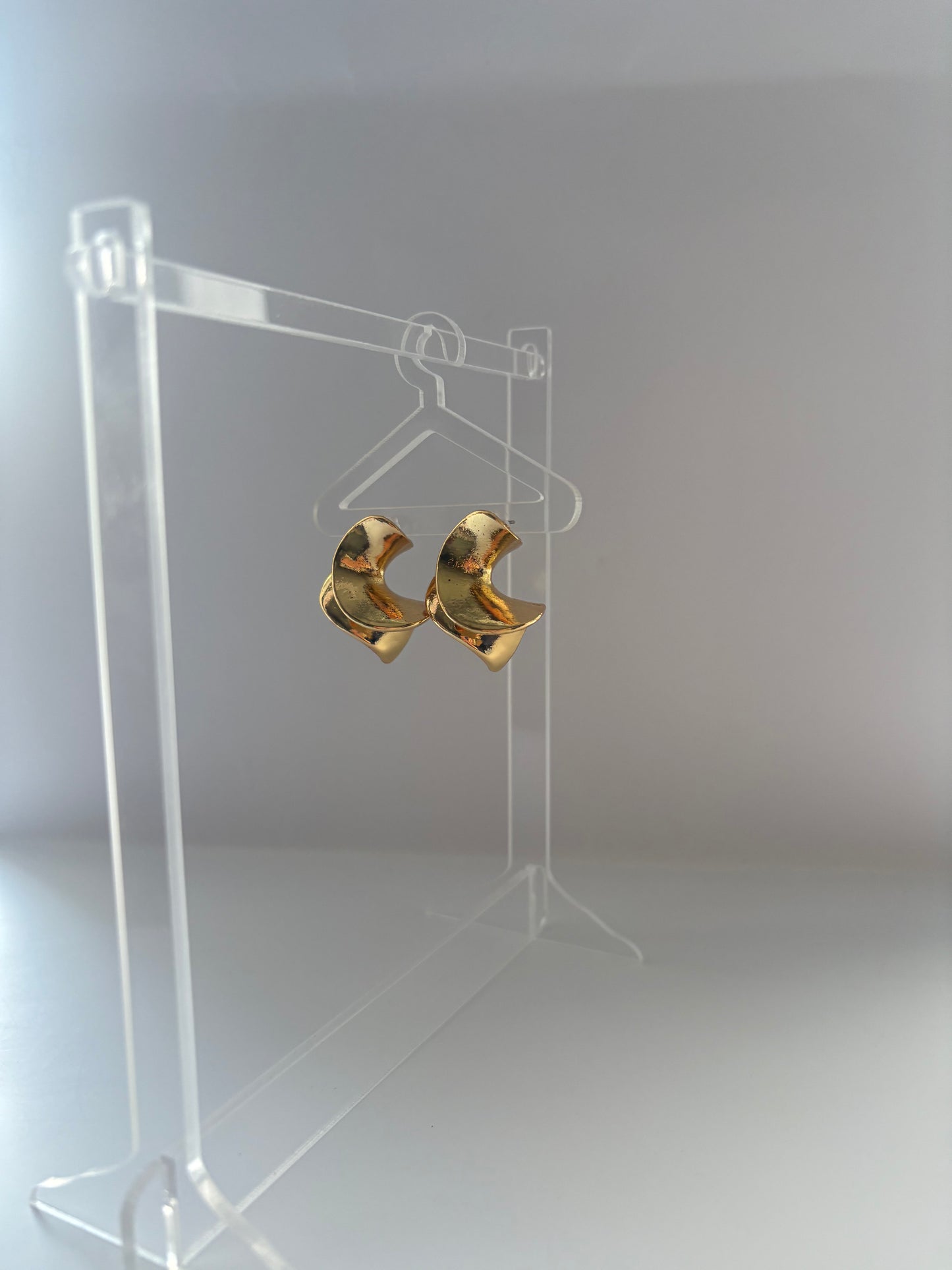 Gold swirl earrings