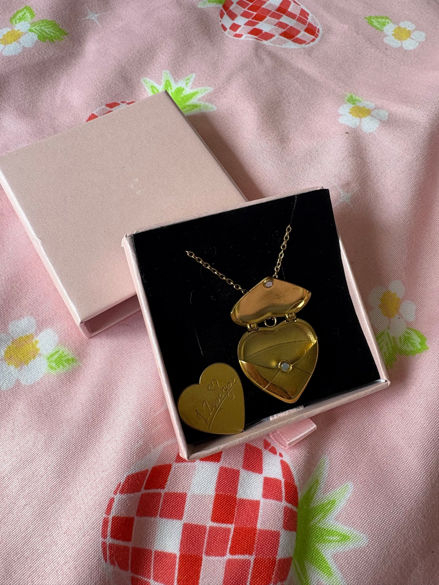Golden heart locket