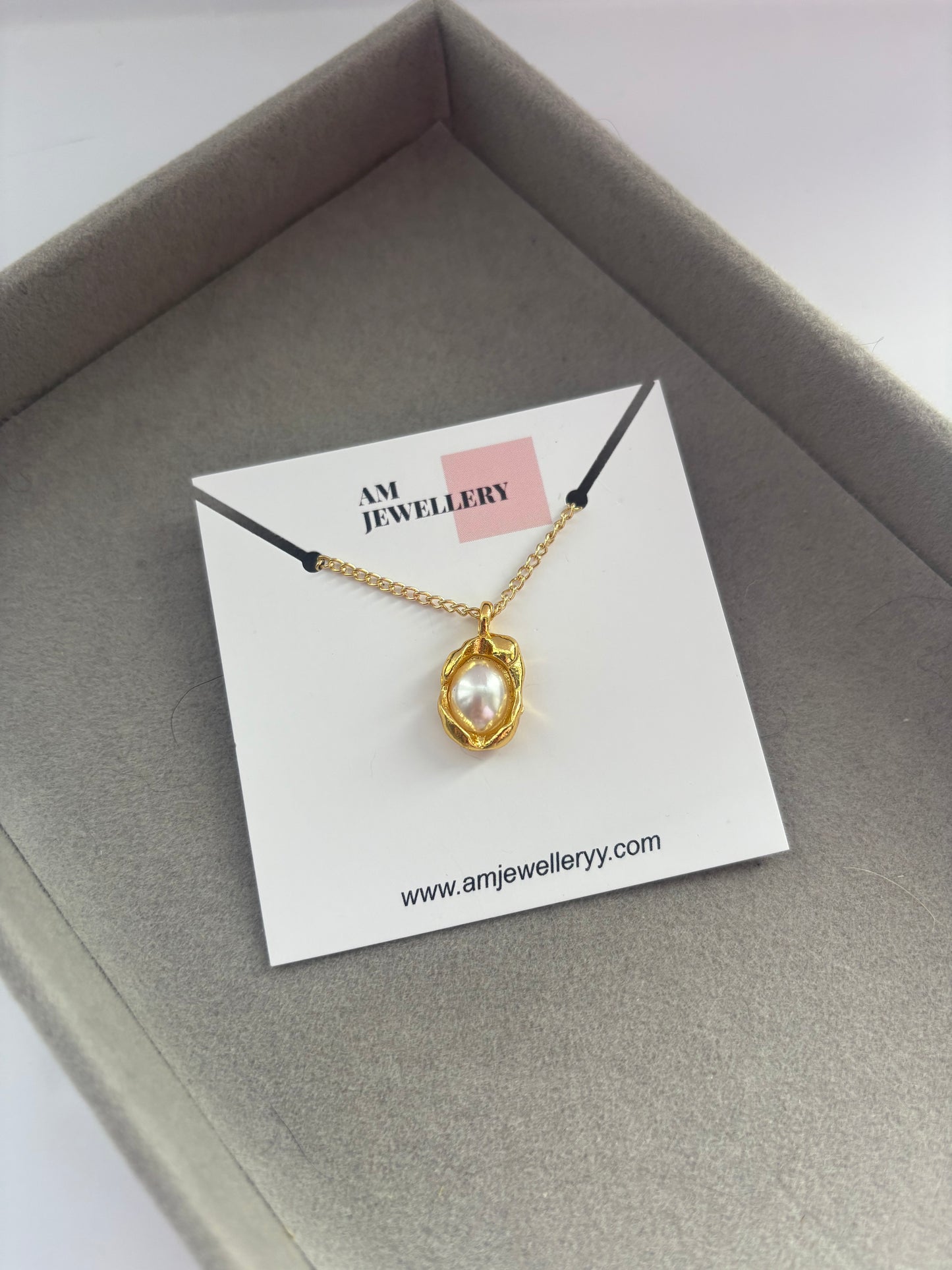 Gold pearl necklace