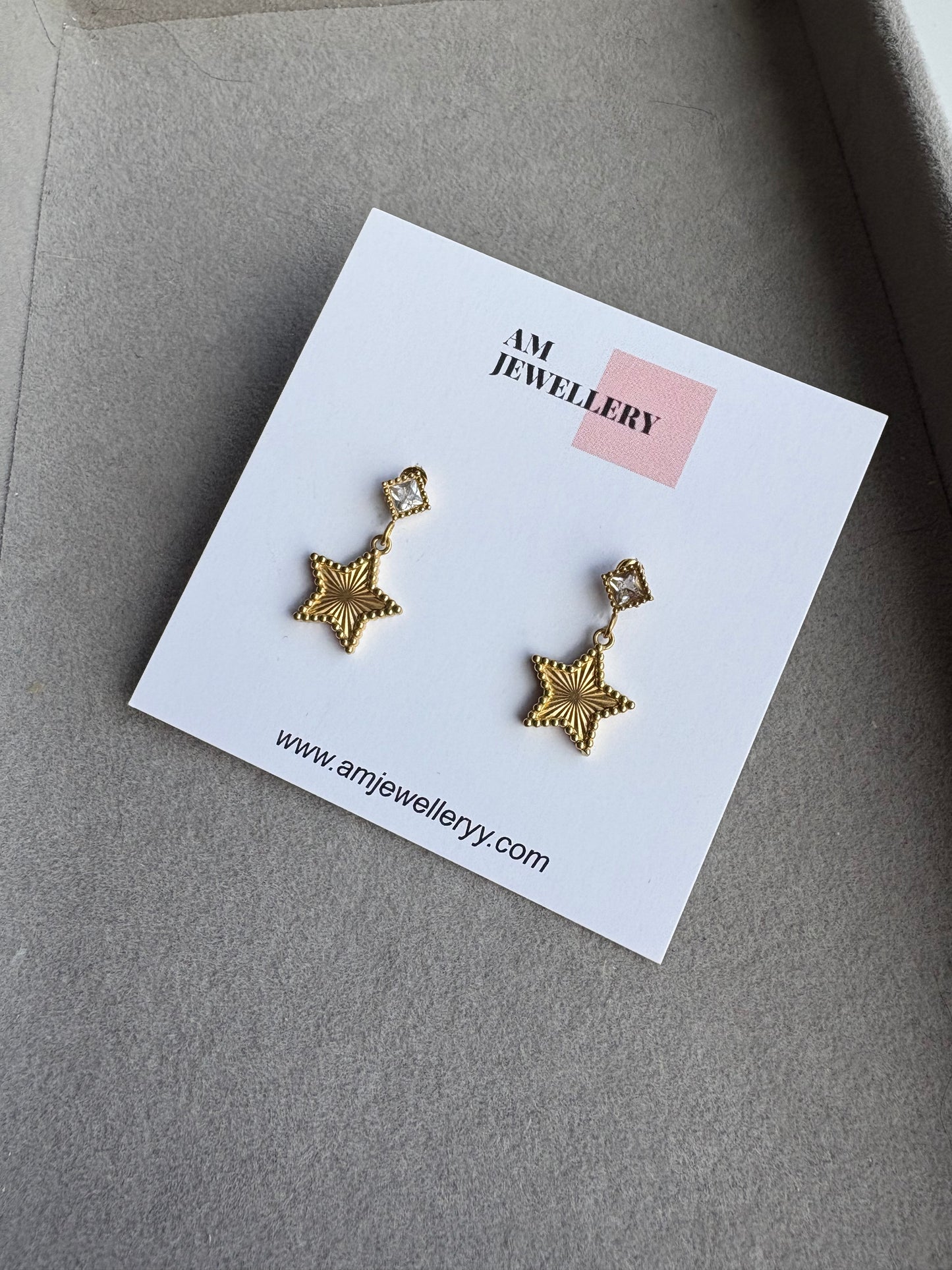Gold star earrings