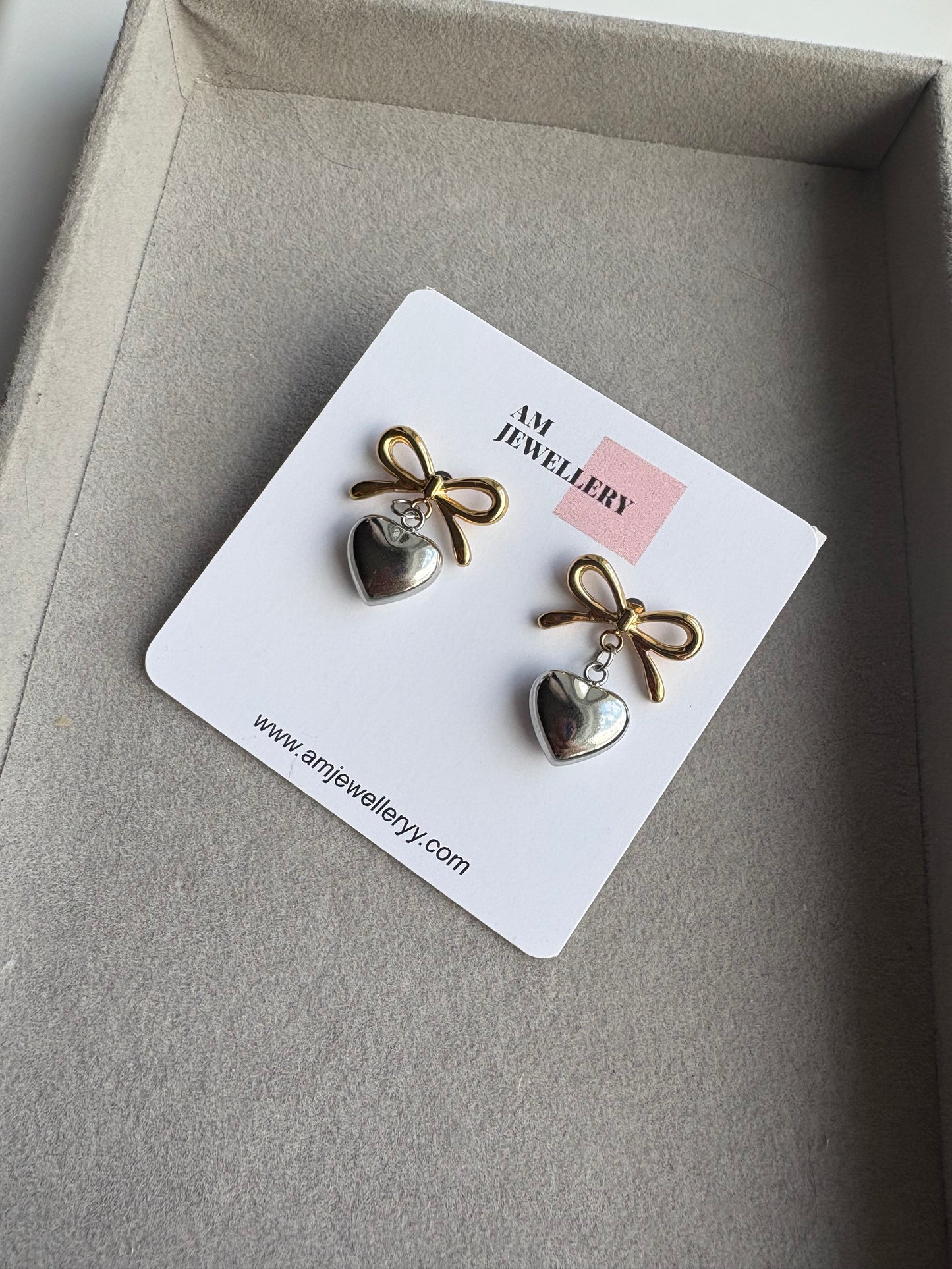 Dropped heart bow earrings